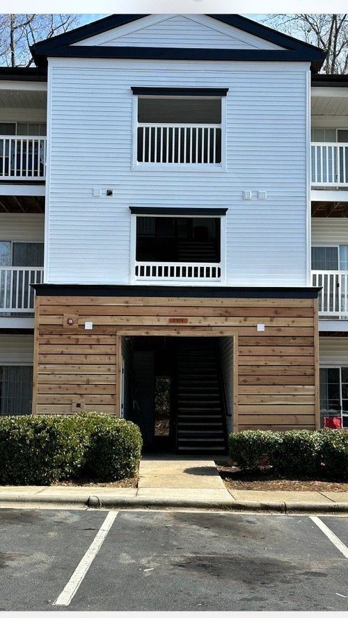 Exterior remodel with a cedar accent wall
